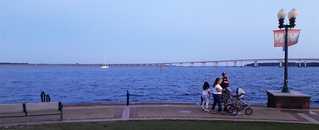 Family walking on the Riverwalk at Union Point Park