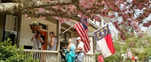 People entering historic home