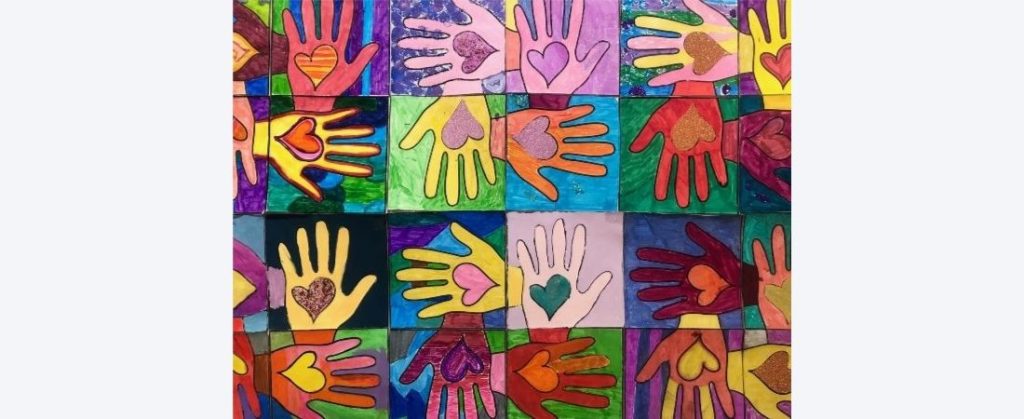 Various colors hands wiht hearts