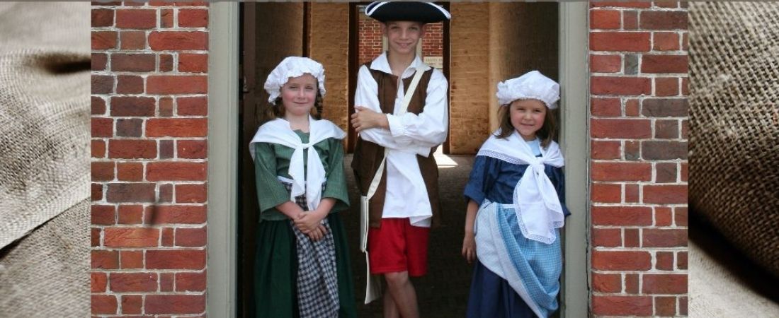 Boy and 2 girls in colonial attire