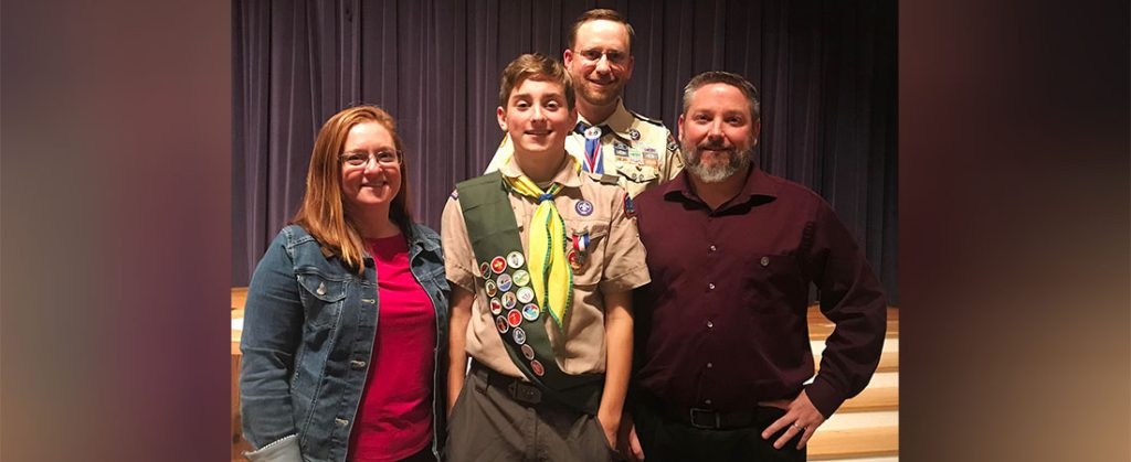 Daniel Fahey with Parents and Scoutmaster Chris Taylor