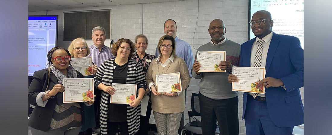 Shown at the check presentation are the principals who won The Bate Foundation Individual School Grants along with PIE board members, left to right, Don Brinkley, Debra Hurst, and Mike McCoy. The principals are, left to right, Stefanie King (West Craven Middle), Dr. Suzanne Averitt (Oaks Road Academy), Catherine Alligood (A.H. Bangert Elementary), Sherri Thomas (James W. Smith Elementary), Jerry Simmons (New Bern High), and Taimak Willis (J.T. Barber Elementary)