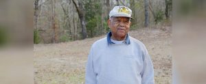 Jones County native Sam Barber stands near the site of his family's graveyard in Trenton that dates back to the late 19th century. Barber is working to get the plot cleaned up and recognized with a memorial marker.
