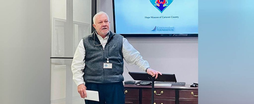 Gene McLendon, executive director of Hope Mission of Carteret County, discusses the nonprofit's plans for grant funds it was recently awarded through the CarolinaEast Foundation. Photo by Todd Wetherington.
