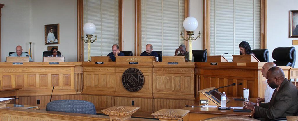 Alderman Rick Prill of Ward 1, Alderman Hazel Royal of Ward 2, Alderman Bobby Aster of Ward 3, Mayor Jeffrey Odham, Alderman Johnnie Ray Kinsey of Ward 4 and Alderman Barbara Best of Ward 5 in City Hall courtroom in downtown New Bern taken on Aug. 2, 2024. (Photo by Wendy Card)