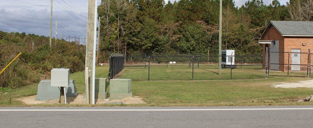 Notice of Public Hearing signs posted on dead end street near Hwy 55 in New Bern, NC. (Photo by Wendy Card)