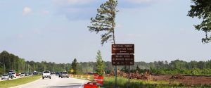 Signs for National Forest Recreation Area and Neuse River-Flanners Beach off US 70 between New Bern and Havelock, NC. (Photo by Wendy Card)