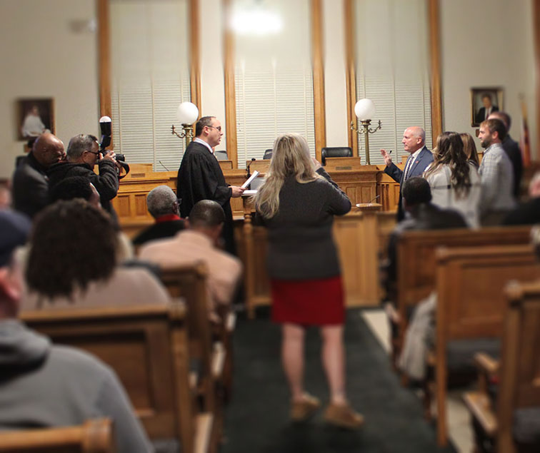 Superior Court Judge Gus Willis administers oath to Alderman Dana Outlaw of Ward 6. (Photo by Wendy Card)