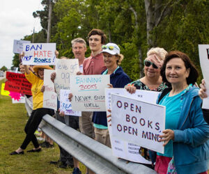 People protest book bans in front of Grover C. Fields. Photo by Matt McCotter.