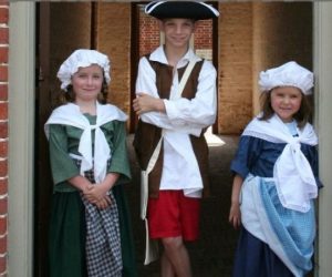 Boy and 2 girls in colonial attire