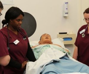 Nursing students with patient