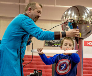 Science Wizard David Hagerman with student (photo by Carolyn Baillargeon)