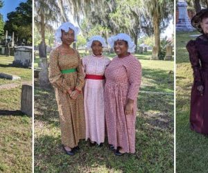 Women and men in cemetery in 1800s clothing