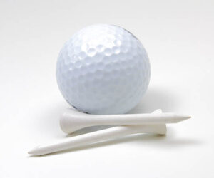 "Golf Ball and Tees on White Background" by Trostle is licensed under CC BY 2.0.