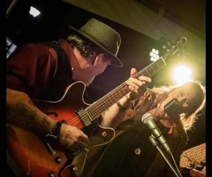 Jim Kohler with Kathleen on stage