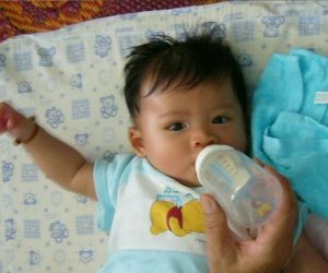 Infant with bottle