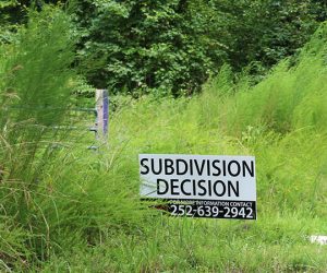 Subdivision Decision sign off County Line Road. (Photo by Wendy Card)