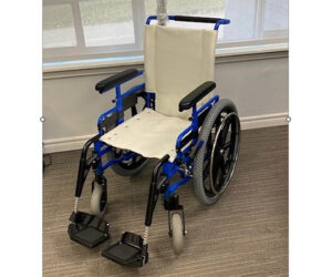 Wheelchair outfitted to traverse Tryon Palace grounds