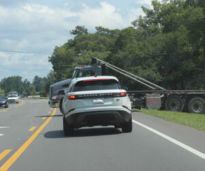 Truck backs into driveway from highway in New Bern, N.C.