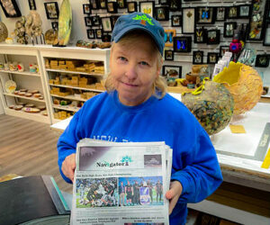 Wendy Card delivering the Navigator Newspaper in New Bern, NC.