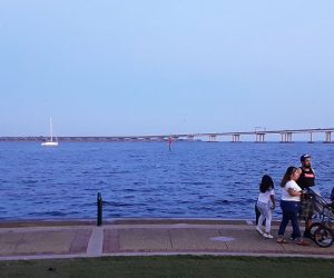 Family walking on the Riverwalk at Union Point Park